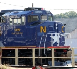 RNCX 1859 sits behind the fueling racks in the NS yard